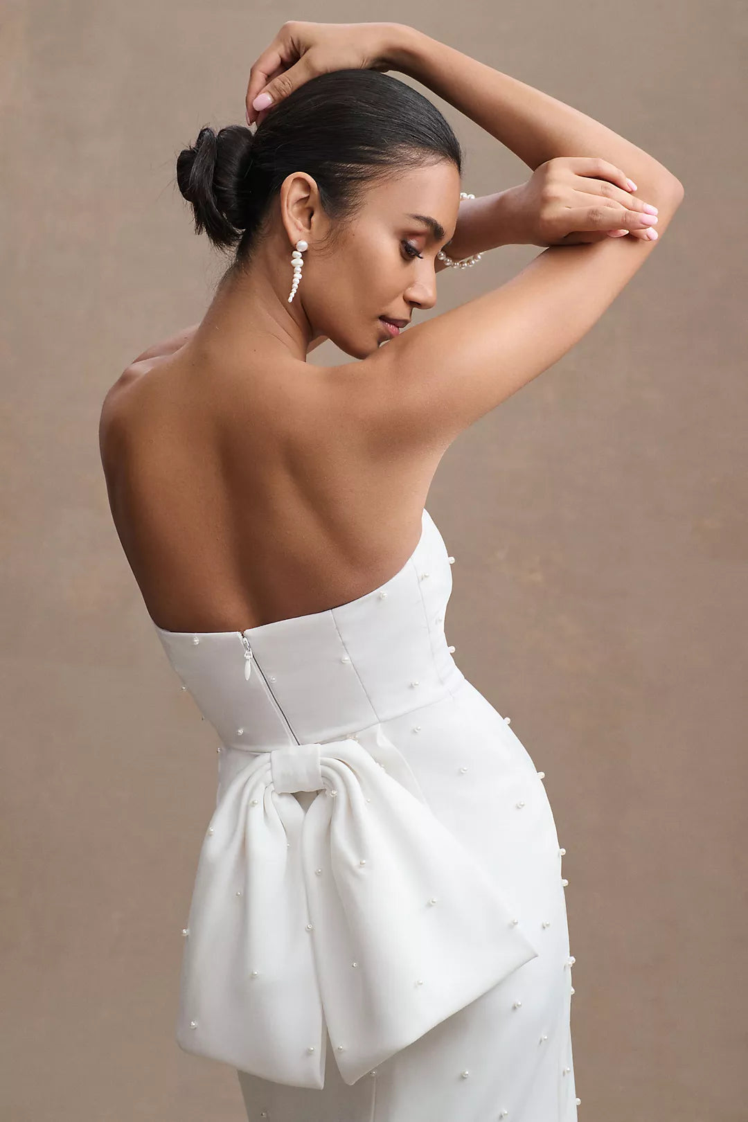 STRAPLESS PEARL BACK BOW DRESS