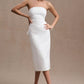 STRAPLESS PEARL BACK BOW DRESS