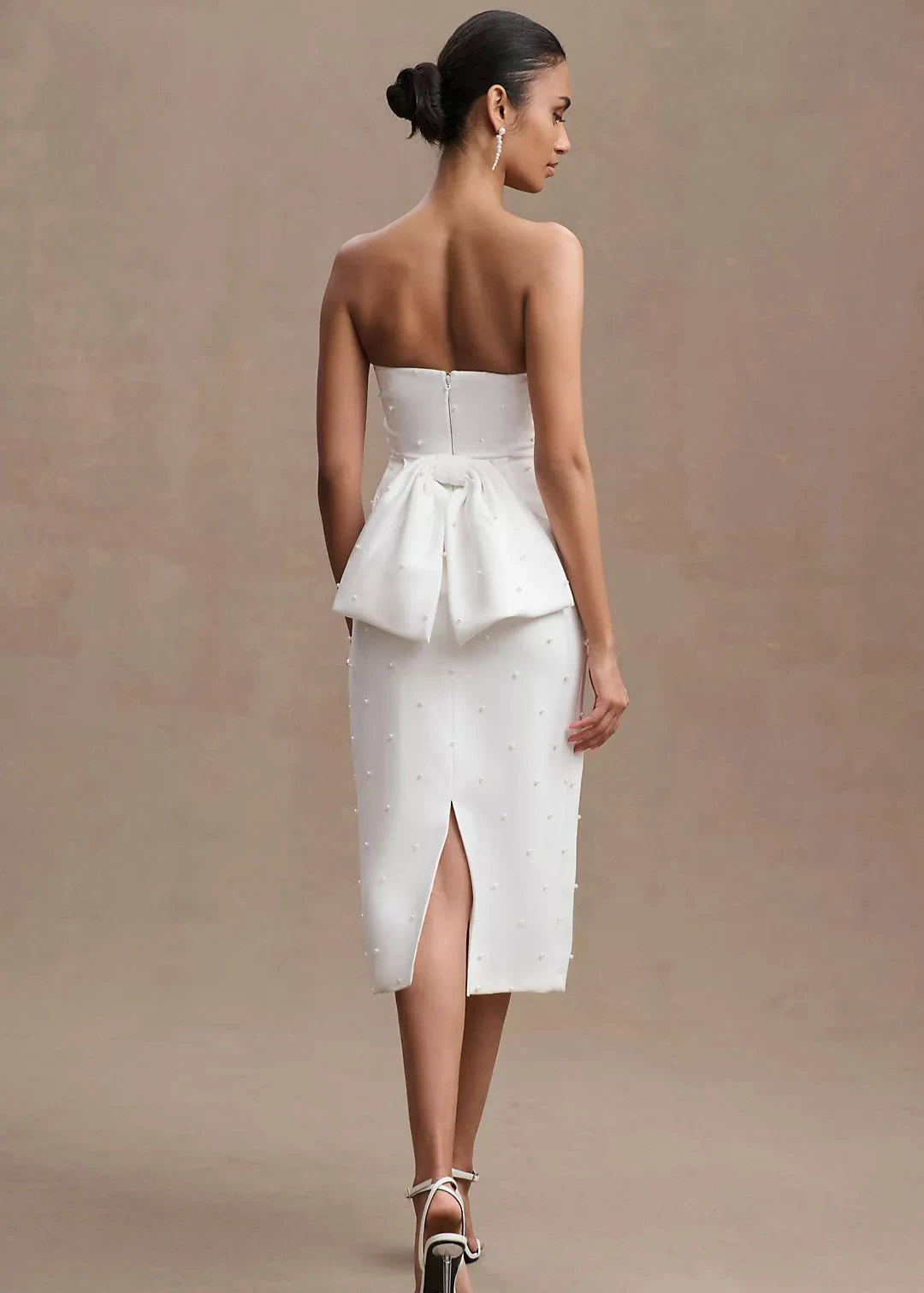 STRAPLESS PEARL BACK BOW DRESS