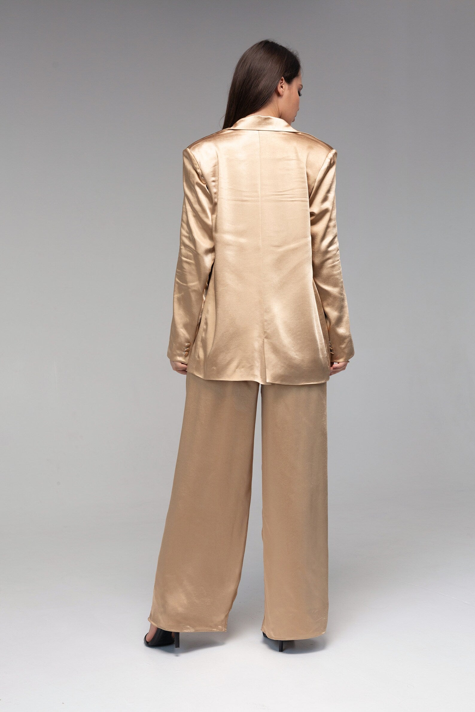 Women Solid Medium Gold Mid Rise Shiny Pants